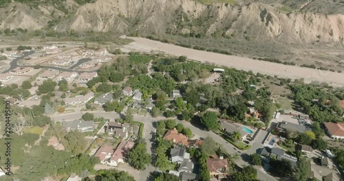 aerial view of European canyon with river and village