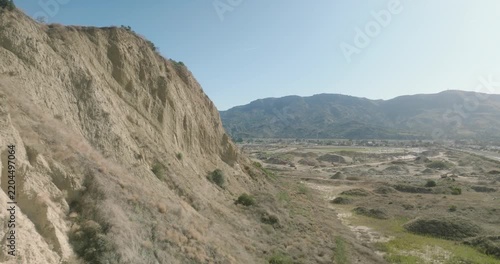 aerial view of eroded badlands cliff formations