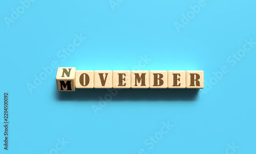 Movember november text font cube block wooden blue color moustache man male father awareness symbol sign beard cancer retro gentleman hipster fashion support november movember cancer beard hope event 