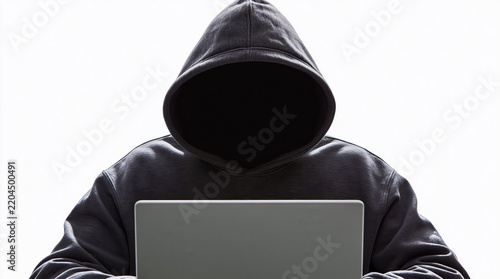 Faceless hooded person using laptop on white background, cybercrime and online hacking concept