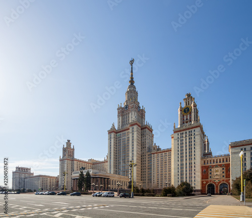 View of the main building of Moscow State University. High-rise building with a spire. Skyscraper in neoclassical style. Architectural dominant and landmark of Moscow. Higher education in Russia.