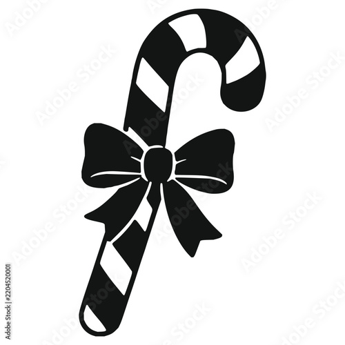 Christmas candy cane with a bow silhouette icon