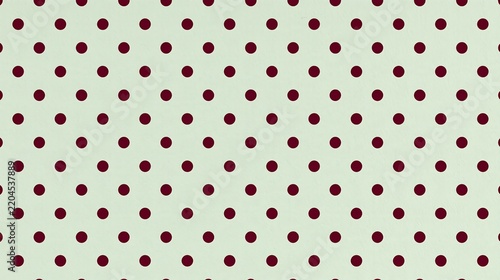 Classic burgundy polka dot pattern on light cream background