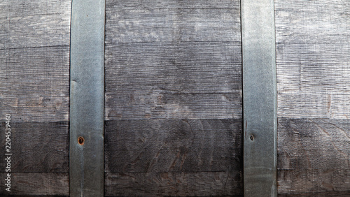Weathered Oak Wine Barrel Texture with Aged Metal Hoops for Copy Space Backdrop