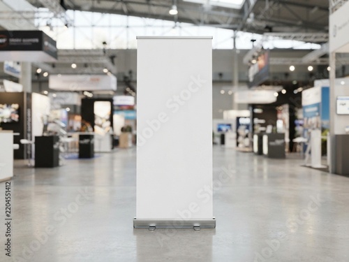 Realistic roll-up banner standee mockup in a contemporary exhibition hall