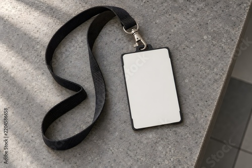 Blank Employee ID Card Badge Mockup with Black Lanyard on Stone Desk for Corporate Office Branding