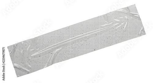 A piece of transparent adhesive tape stuck against a clean background, capturing the texture and slight wrinkles of the plastic material isolated on transparent background