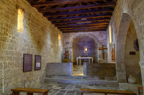 Interior of St Lucia church in Jurandvor with the Baška tablet replica in the chancel screen and wooden roof, Krk island, Croatia
