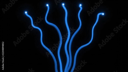 Abstract glowing blue fiber optic lines representing data transmission on a black background.