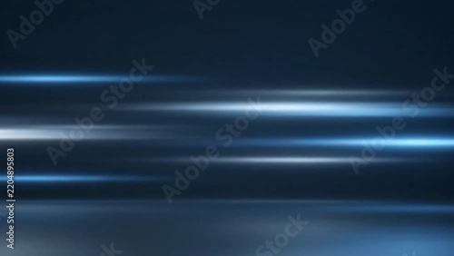 Abstract blue light streaks on dark background representing speed and technology motion blur.