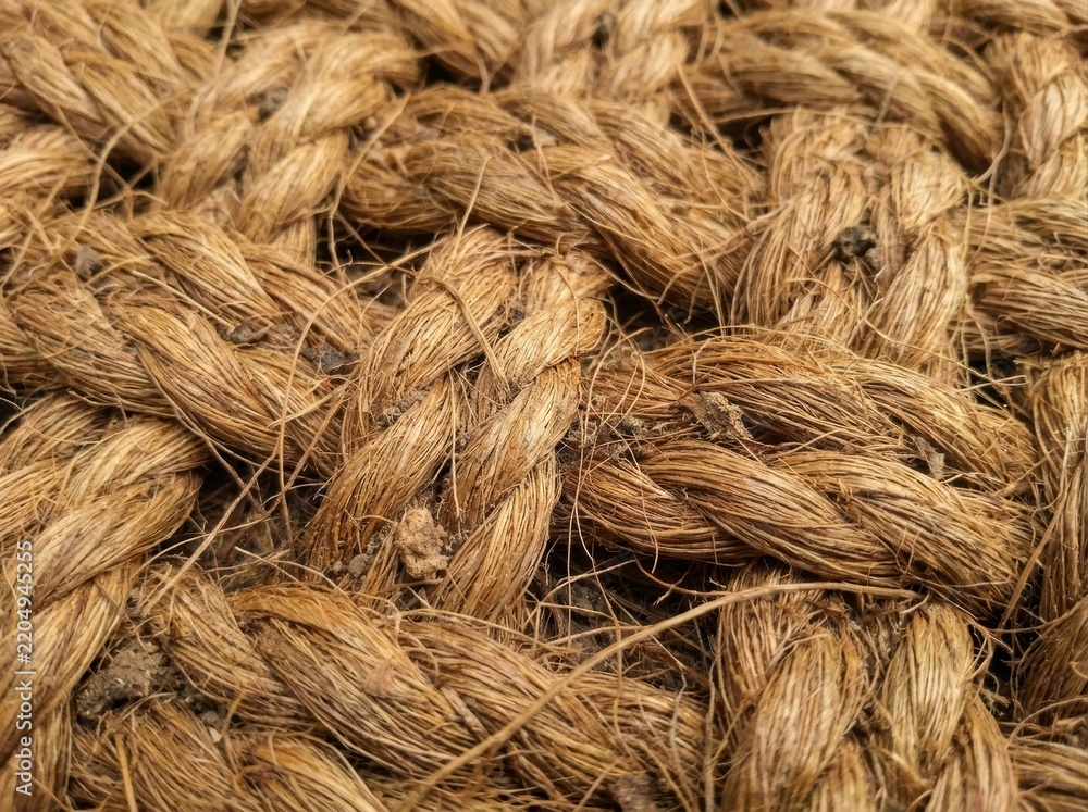 Fototapeta premium coconut coir texture background Close-up of coiled natural hemp fiber ropes in a textured pattern