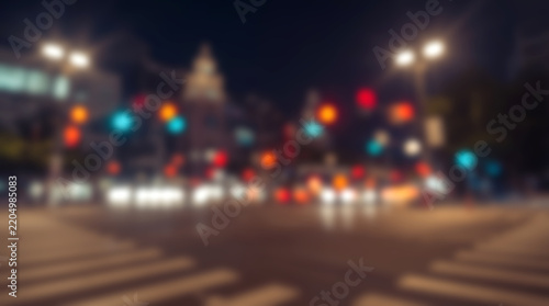 Abstract blurred city street at night with colorful bokeh lights