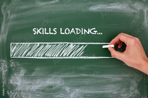 Hand drawing skills loading progress bar with white chalk on a green chalkboard