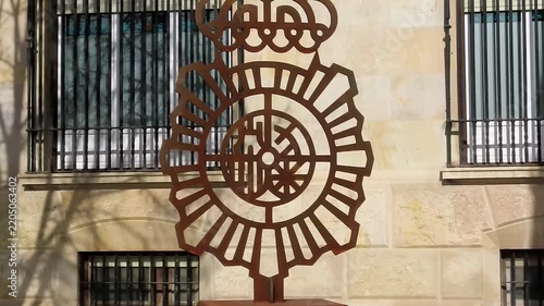 26-02-2026 Teruel, Spain, aniversary Rusty Metal Spanish National Police Emblem Sculpture Monument Tilt Up