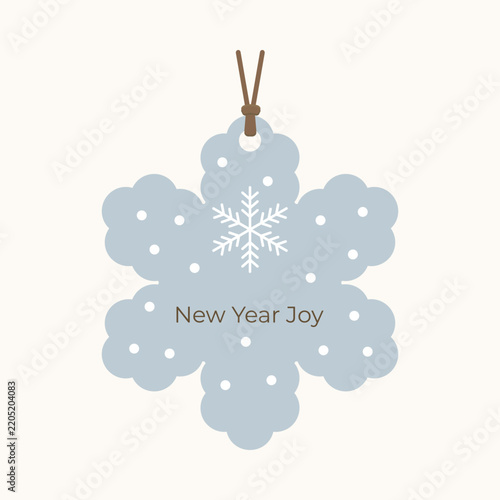 A blue gift tag in the shape of a snowflake featuring detailed snowflake line art, white snow dots, and New Year Joy text. Creative winter festive label.
