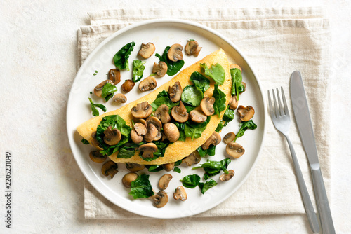 Delicious omelette with mushrooms and spinach