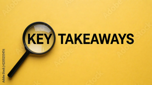 Magnifying glass highlighting the text key takeaways on a yellow background
