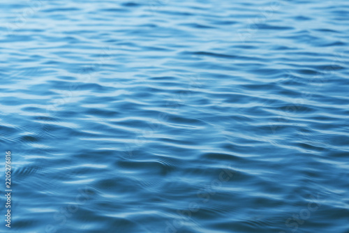 The glare of the water in the sea.