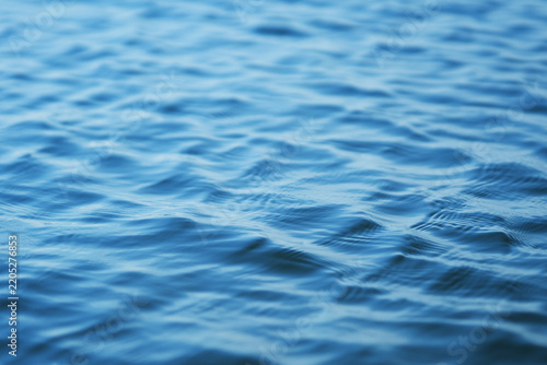 The glare of the water in the sea.