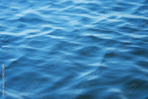 The glare of the water in the sea.