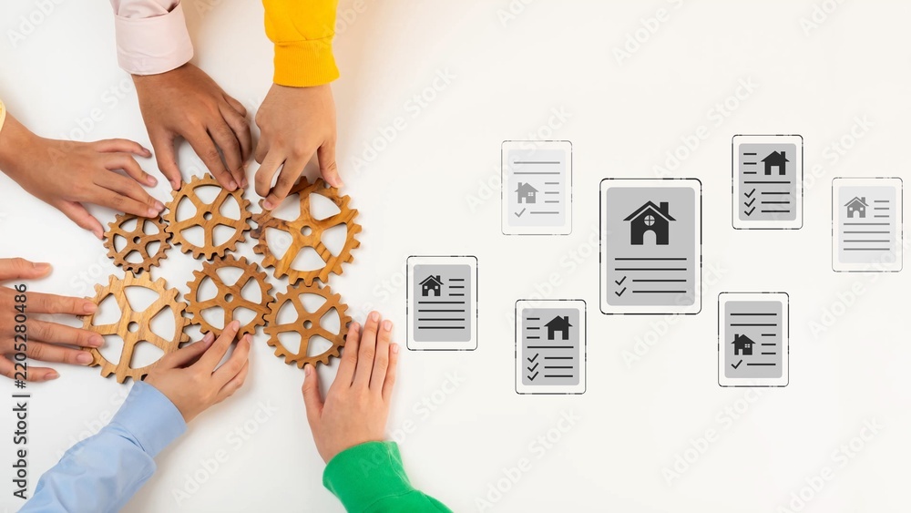Obraz premium Collaborative Teamwork Concept with Diverse Hands Working Together with Gears and House Icons Symbolizing Real Estate Project Development and Success Gluon.