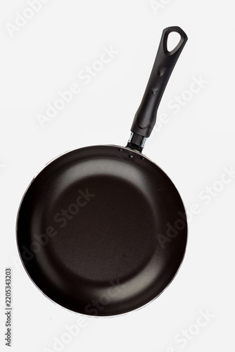 Top View of New Non-Stick Frying Pan Isolated on White Background