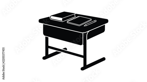 School desk with books and supplies is a black silhouette