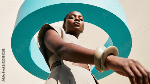 Confident Fashion Woman in Bold Geometric Architecture