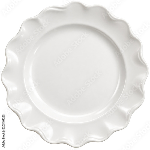 White Plate With a Scalloped Edge on a Plain Background