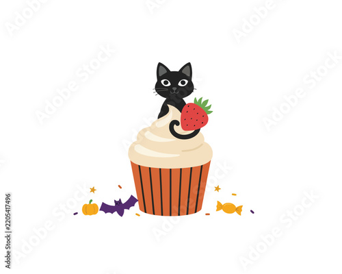 Black cat decorating halloween cupcake with strawberry
