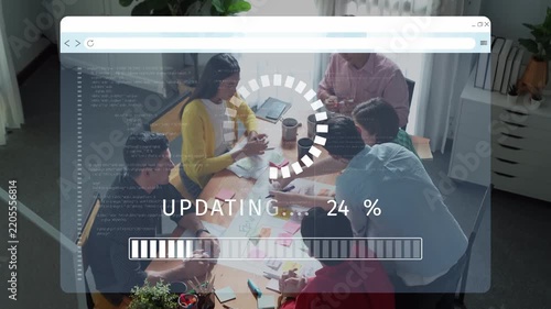 A dynamic team collaborates in a modern office environment while a digital interface displays project progress, illustrating teamwork and innovation in action. Raster