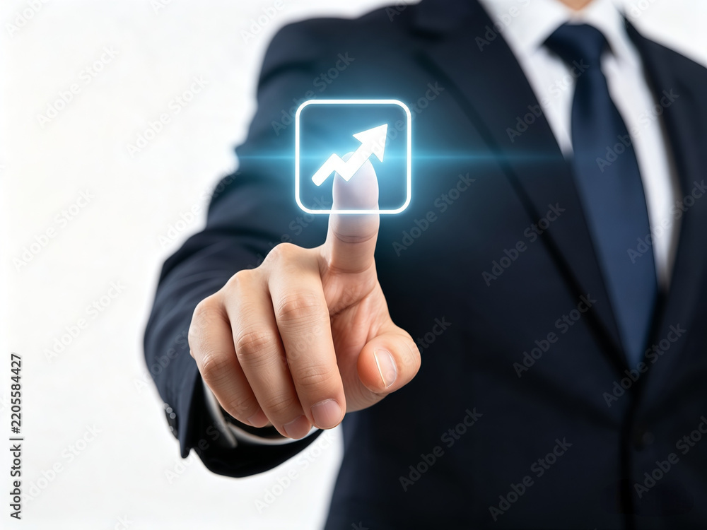Obraz premium Businessman in black suit touching virtual futuristic interface button displaying arrow growing financial graph