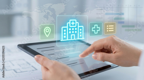 Professional doctor or architect using a digital tablet for global hospital planning and healthcare management with holographic icons and blueprints.