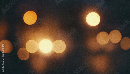 Abstract Retro Gradient Light Leak Effect, Blurred Overlay Film Grain Texture With Soft Glowing Center And Distinct Warm Orange Bokeh Orbs On Dark Background