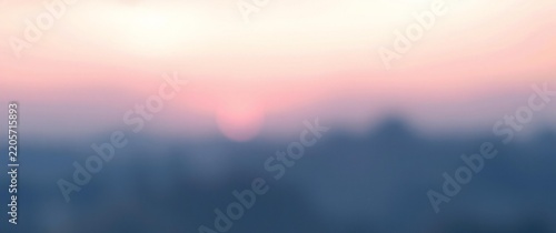 Beautiful soft blurred sunrise sky with gentle pink and blue colors
