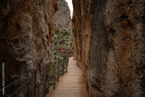 ooden boardwalk clinging to sheer canyon walls at Caminito del Rey, Spain