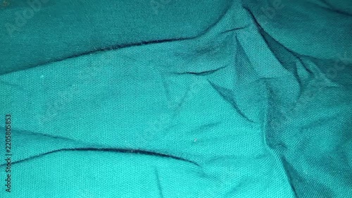 ​Macro Shot of Turquoise Textile Material with Natural Folds
