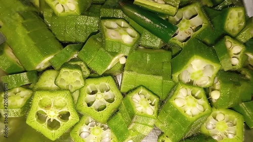 Top-Down Macro Shot of Freshly Sliced Green Okra and Chilies