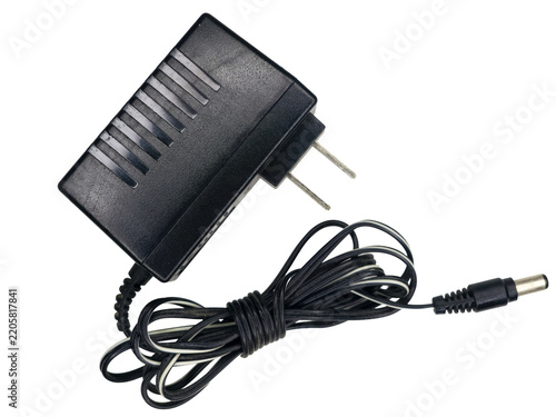 Black electric power adapter plug with cable and barrel connector