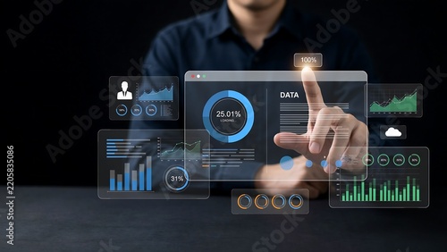 Professional interacting with a futuristic data dashboard for business analytics and strategic management
