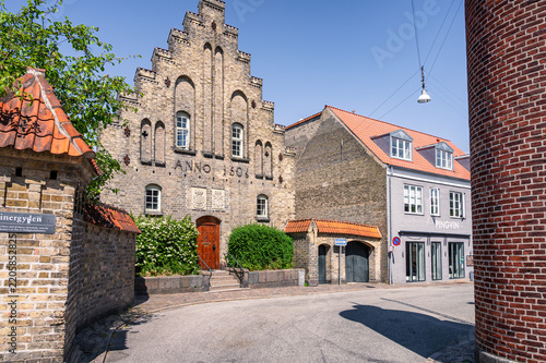 Fotografie Historical brick facade of the Aalborg Kloster monastery with an inscription ANNO 1506 in Denmark
