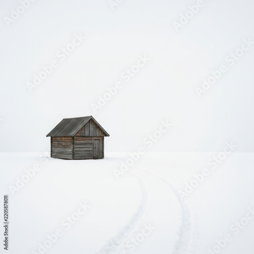 house in snow on white back griund