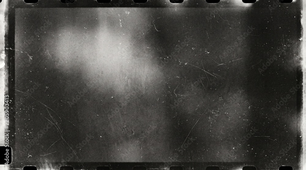 Obraz premium Black and white film negative frame with scratches and sprocket holes