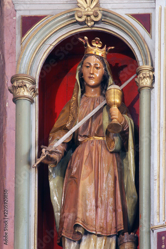 Saint Barbara, statue on the Altar of Our Lady of the Poor in the parish church of Holy Trinity in Rovisce Croatia