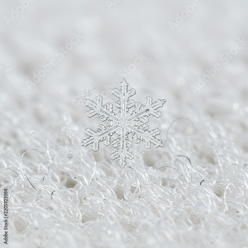 christmas snowflake on snow on white background