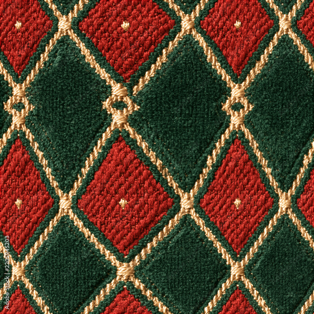 Fototapeta premium Seamless pattern fabric texture displaying a detailed diamond pattern, rich green and red colors, golden embroidered lines, creating an elegant background