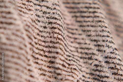Obraz na plátně Texture of warm grey beige knitted blanket with soft subtle ripples