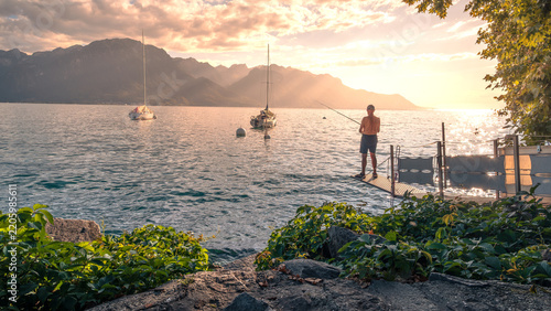 Scenic View of Lake Geneva and the Swiss Alps at Sunset