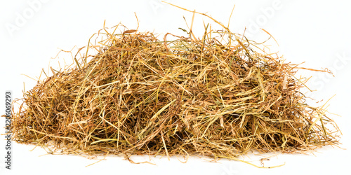 Pile of dry straw or hay natural organic material isolated on white background perfect for agriculture or rustic design concepts