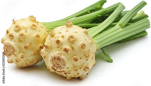 Fresh and organic celeriac with green leaves, perfect for healthy cooking and garnishing dishes with a unique flavor.